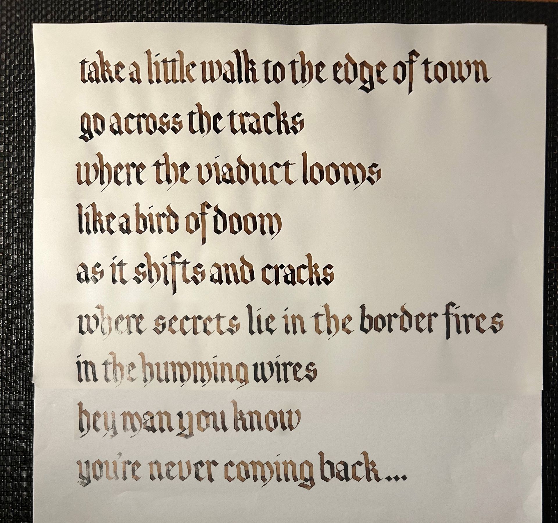DL envelope written in Copperplate calligraphy usign a pointed flexible nib and golden gouache ink by Paula Dakin.