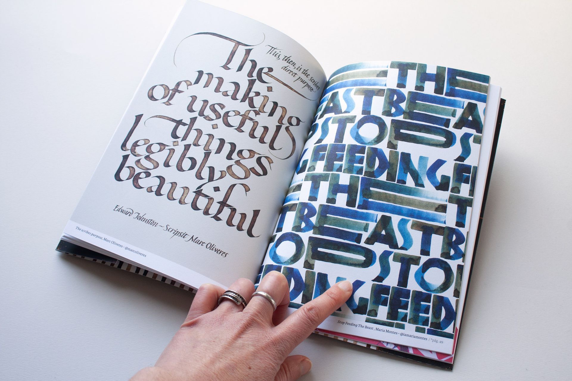 Stop feeding the beast written out using Neuland calligraphy style and a gradients.