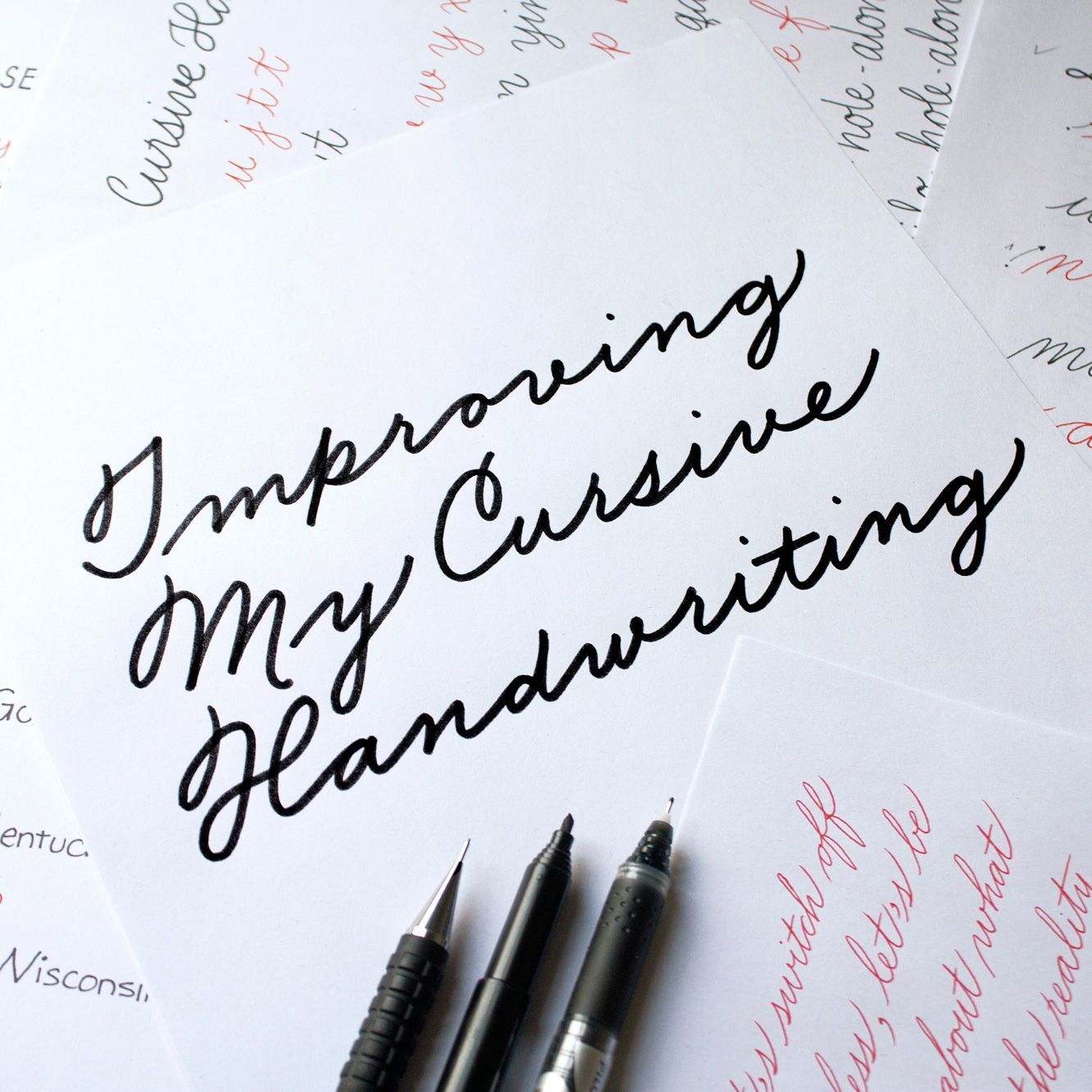 Full-colour image with the message 'Improving my cursive handwriting'.