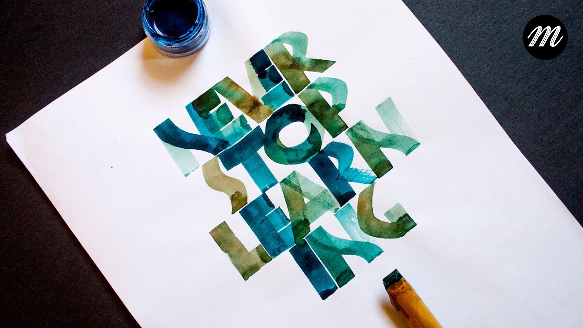 Neuland calligraphy piece with the message 'never stop learning'.
