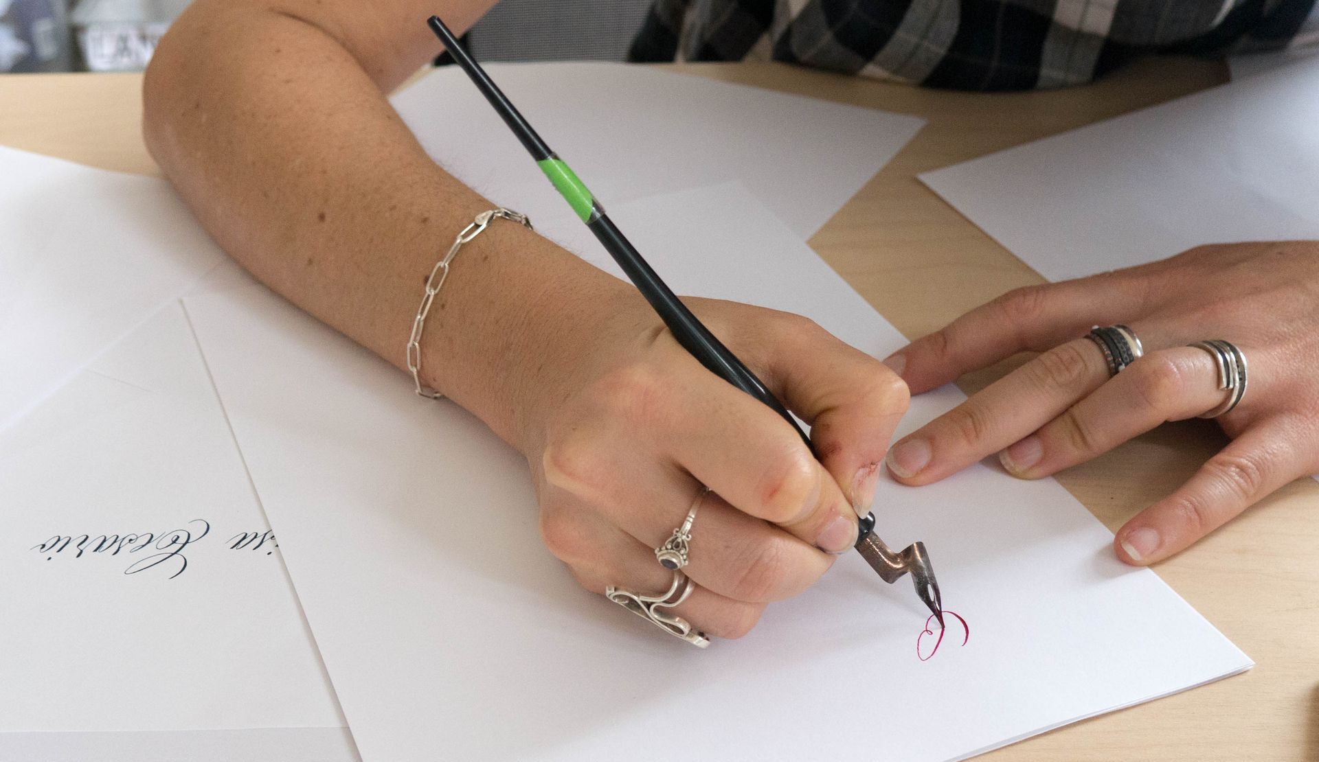 Maria Montes writing Copperplate calligraphy using a straight pen holder and a William Mitchell Elbow nib.