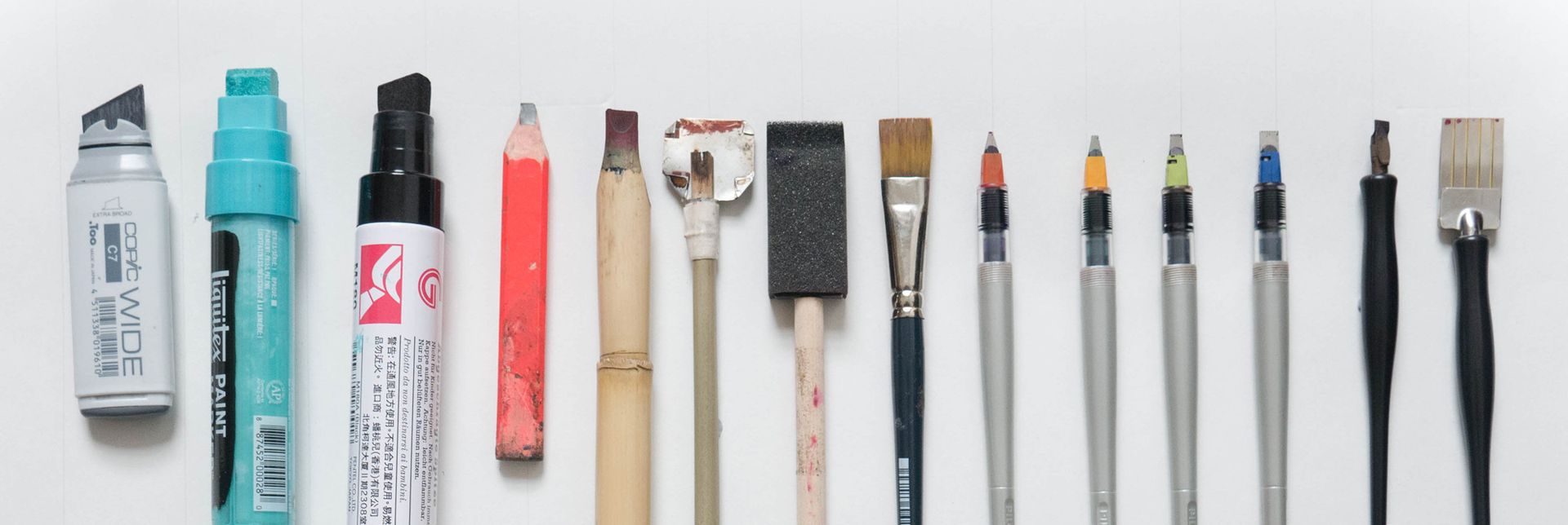 Aset of broad-edge writing tools.