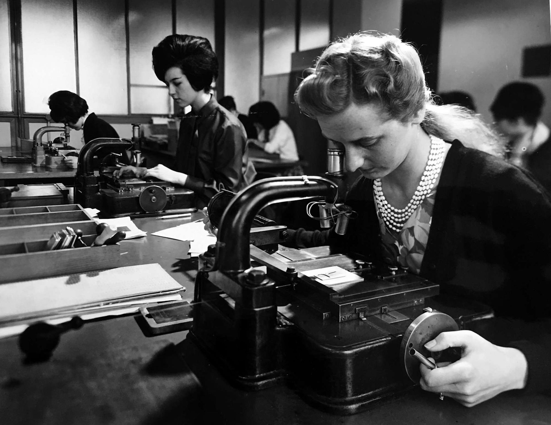 Monotype office workers via https://womenintype.com