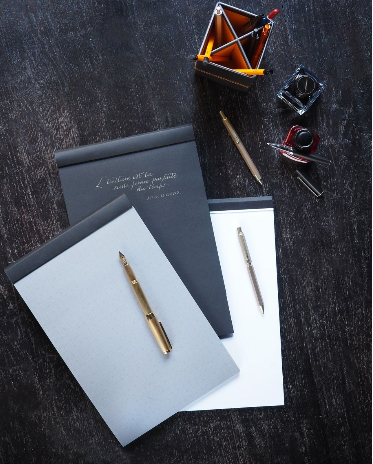 Maya Calligraphy Pads from the Rhodia Touch collection. With 120gsm premium smooth paper and a subtle dot grid. Available in white, grey, and black Clairefontaine Maya® paper.