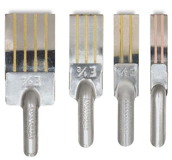 Photo of 4 Speedball steel brush broad-edge nibs.