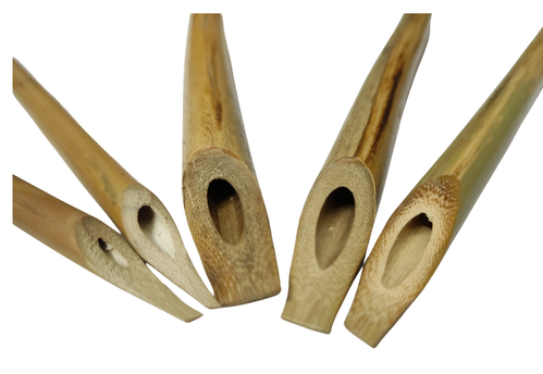Photo of a 5 bamboo pens with a broad-edge shape.