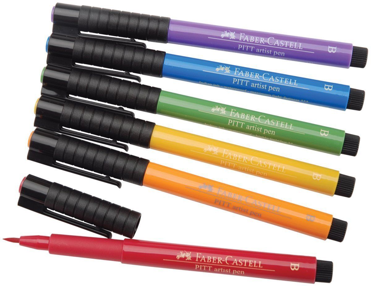 Photo of six Faber Castell Pitt artist brush pens in different colours.