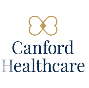 Canford Healthcare logo: gold interlocking heart shape above dark blue text,