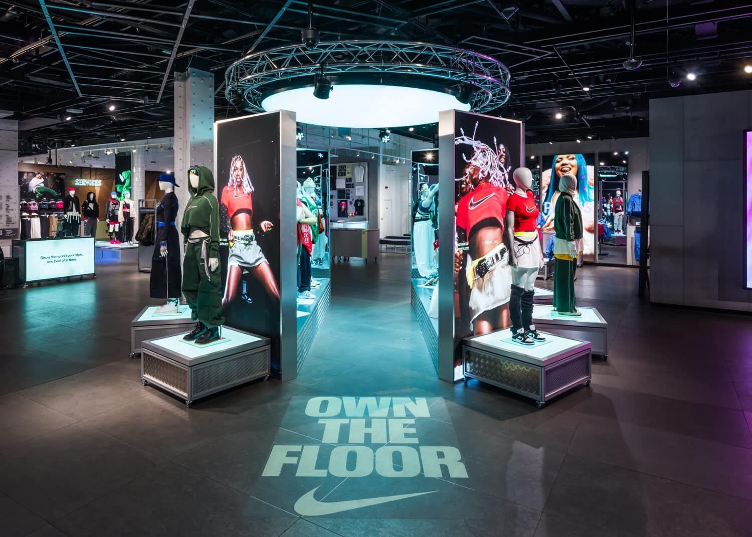Nike store interior with mannequins, displays, and