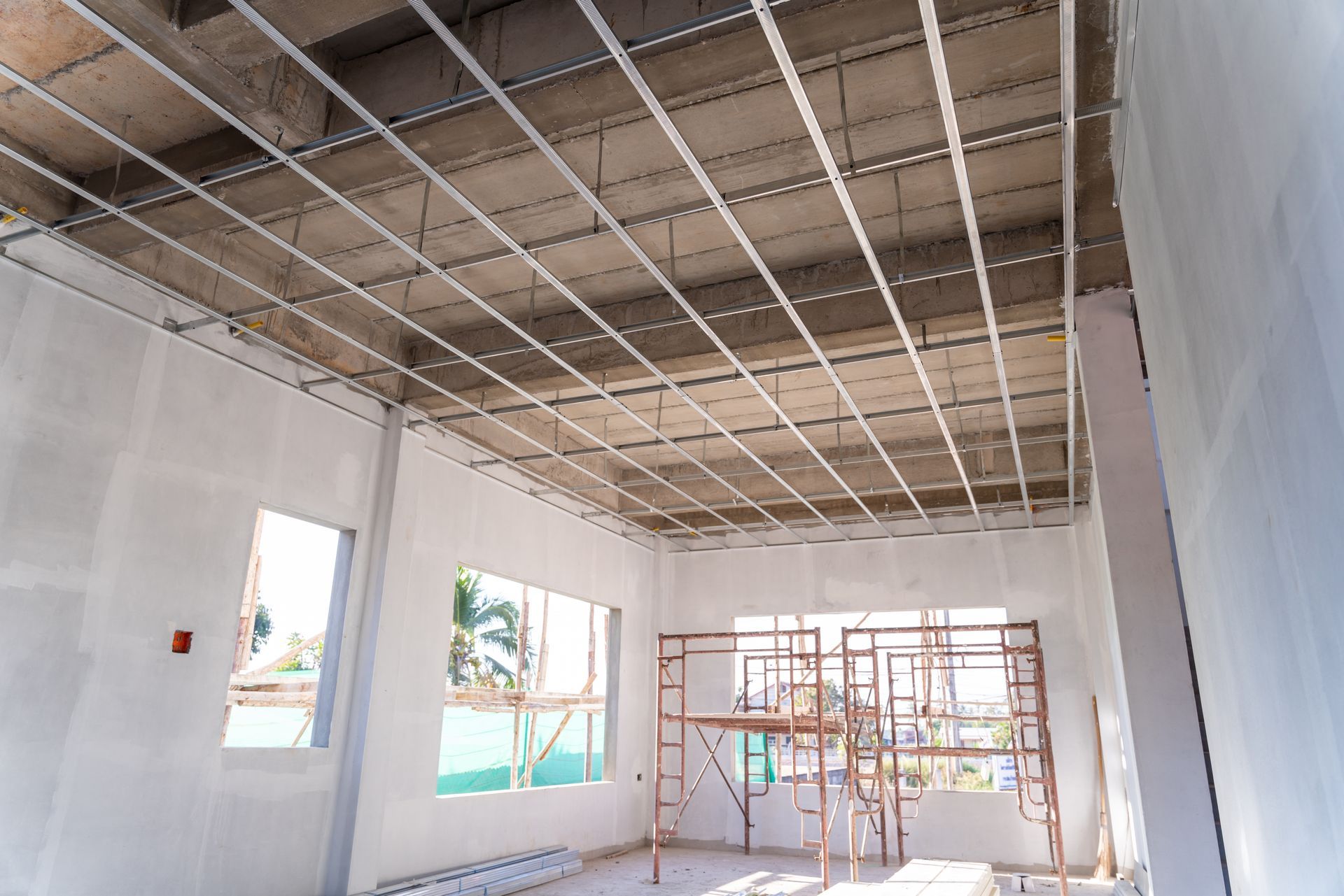 Ceiling framing grid before residential plaster patch repair in a Worcester home under renovation