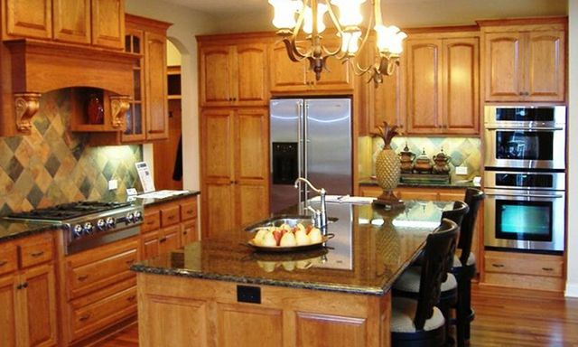 Traditional Kitchen Remodel by Chain Of Lakes Granite Inc project photo