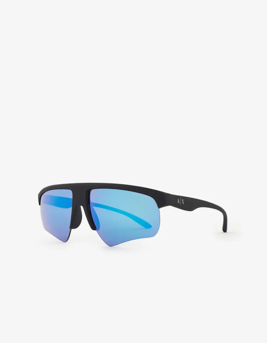 A pair of sunglasses with blue lenses on a white background.