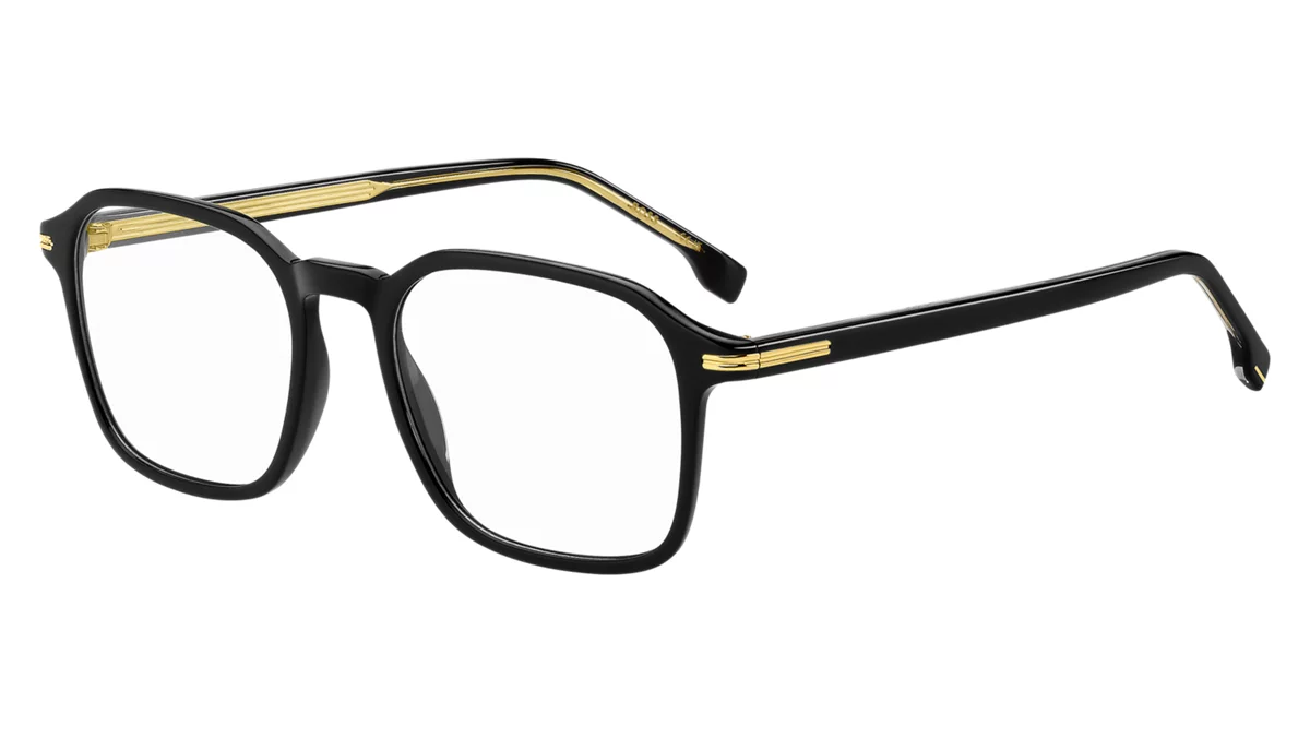 A pair of black and gold glasses on a white background.