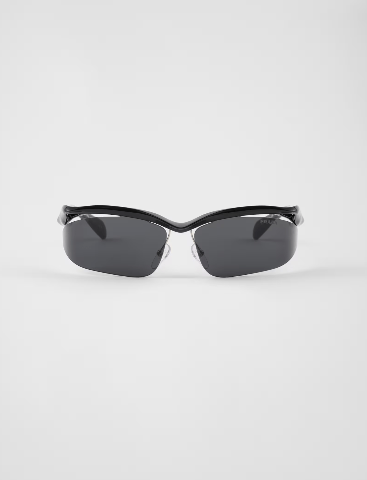 A pair of black sunglasses on a white background.