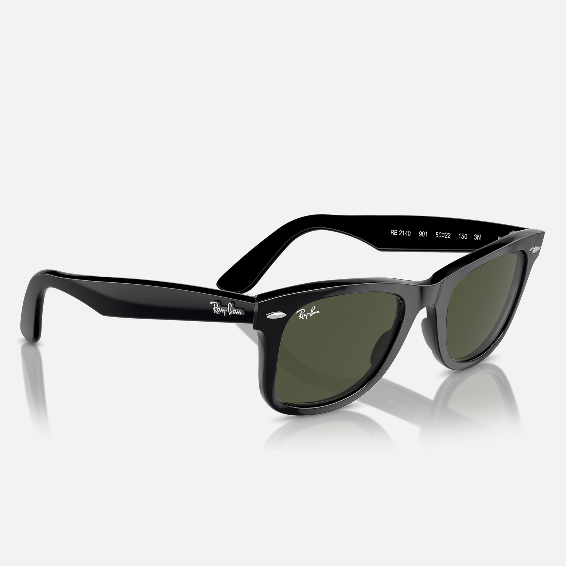 A pair of black ray-ban sunglasses with green lenses