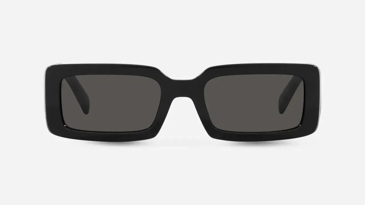 A pair of black square sunglasses on a white background.