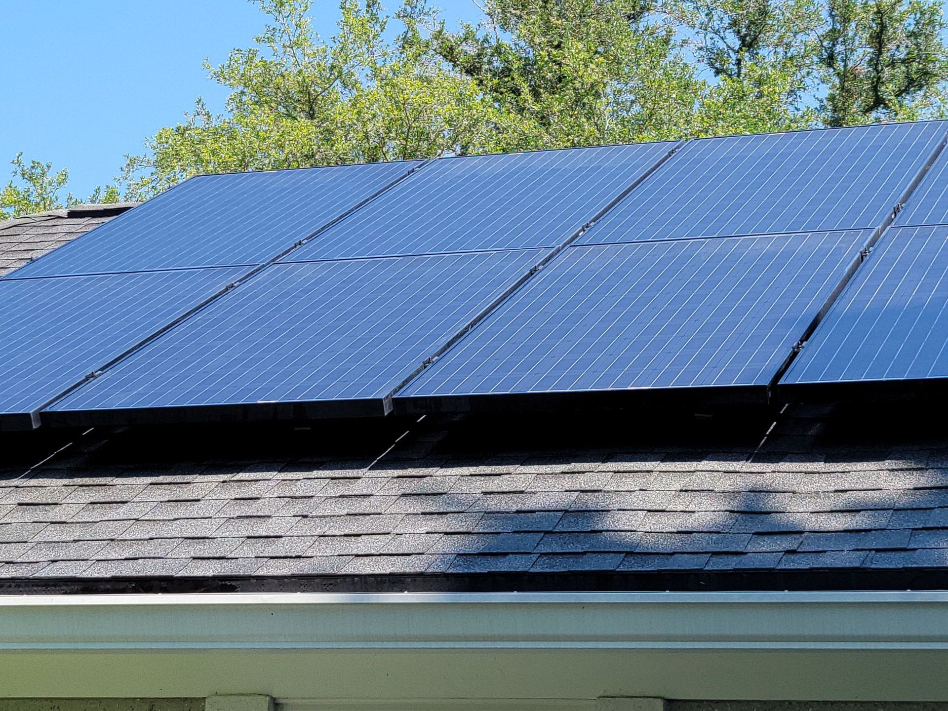 A roof with a lot of solar panels on it