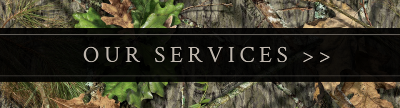 Our Services banner with white text on a black strip over a camouflage background