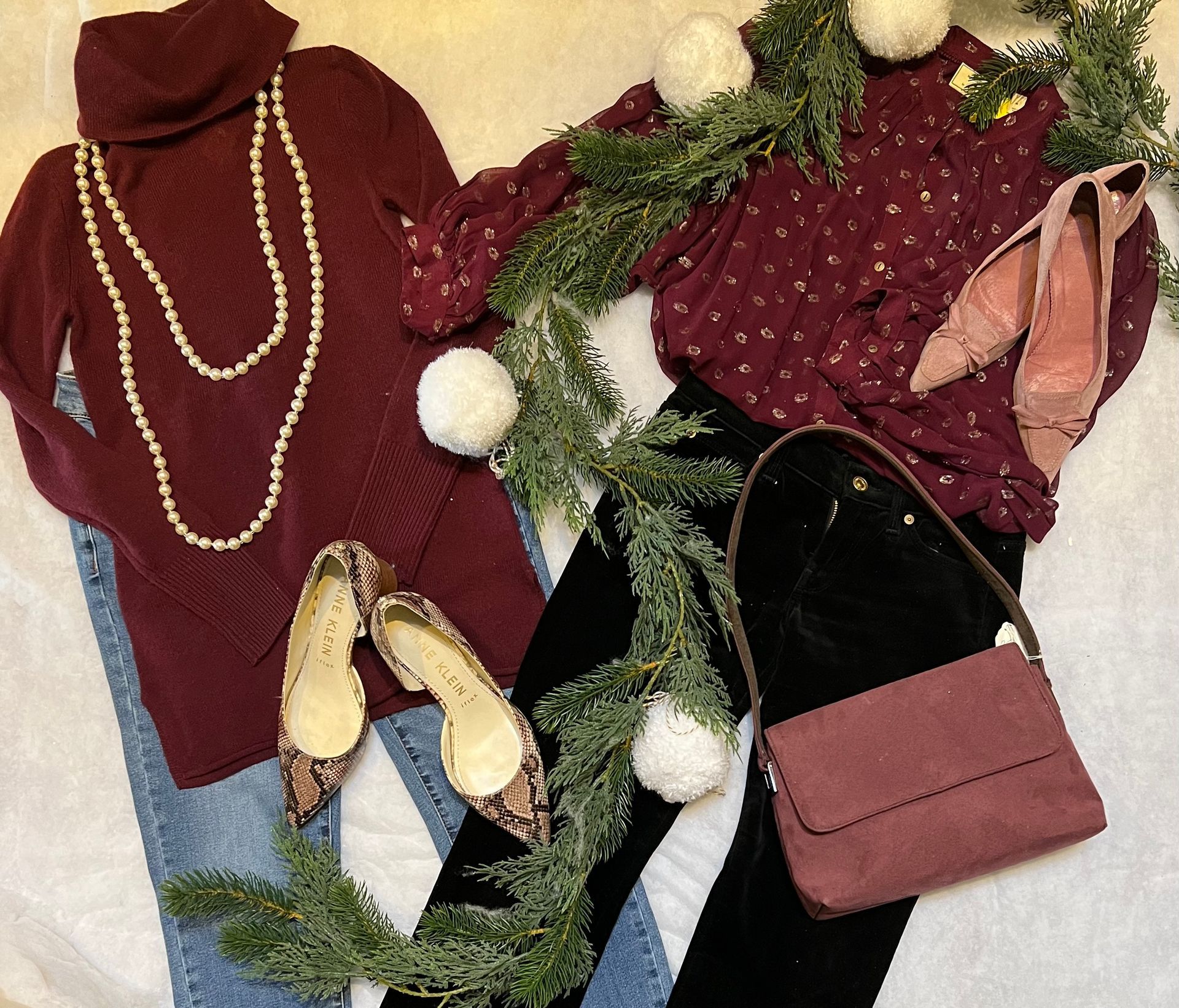 A woman is wearing a turtleneck sweater and a polka dot shirt.
