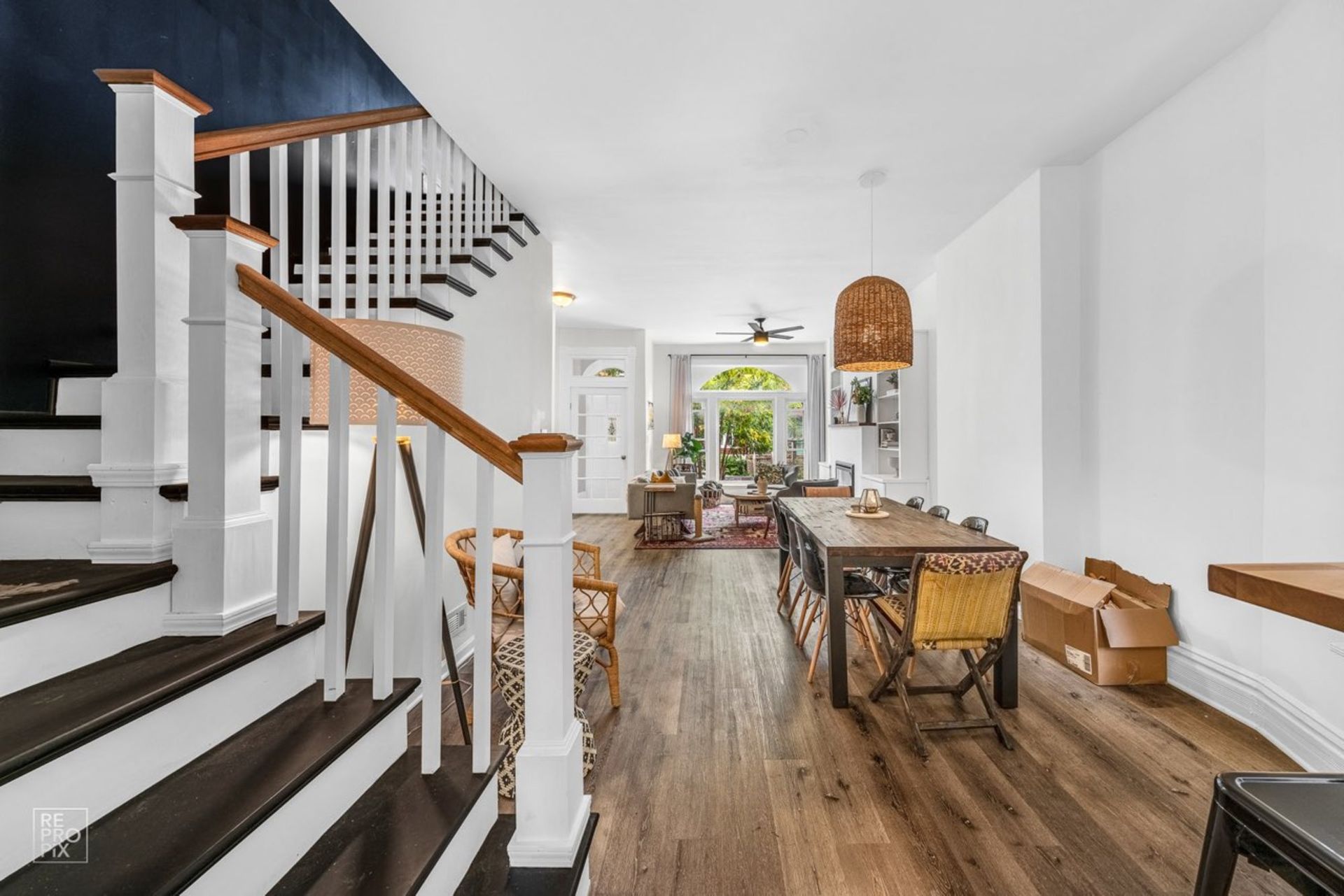 There is a staircase leading up to the second floor of a house.
