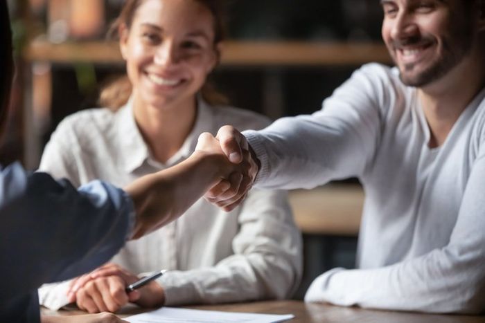 Two people shaking hands