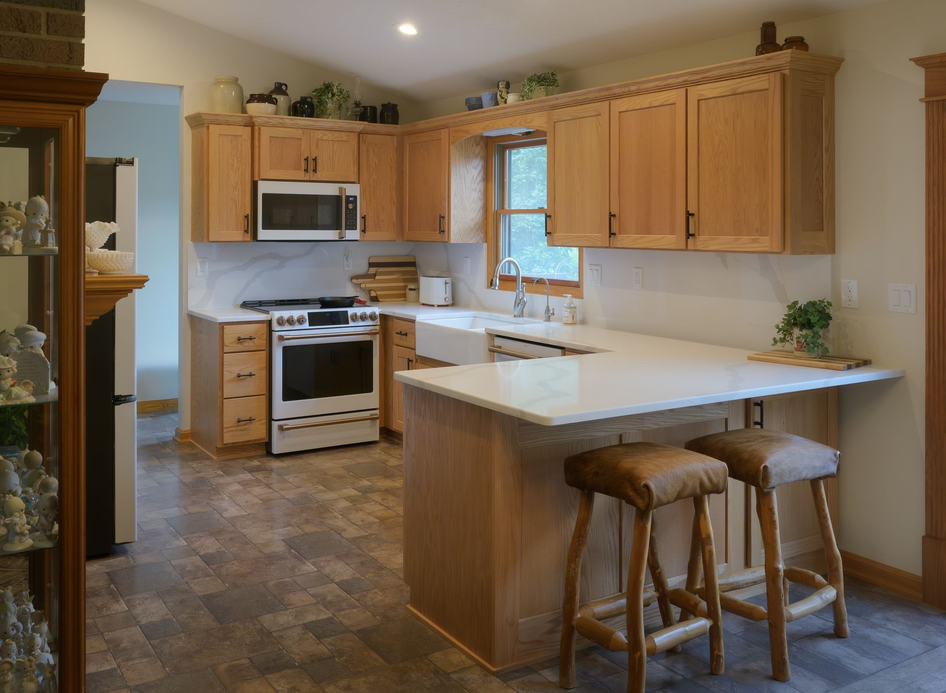Custom red oak kitchen cabinets.