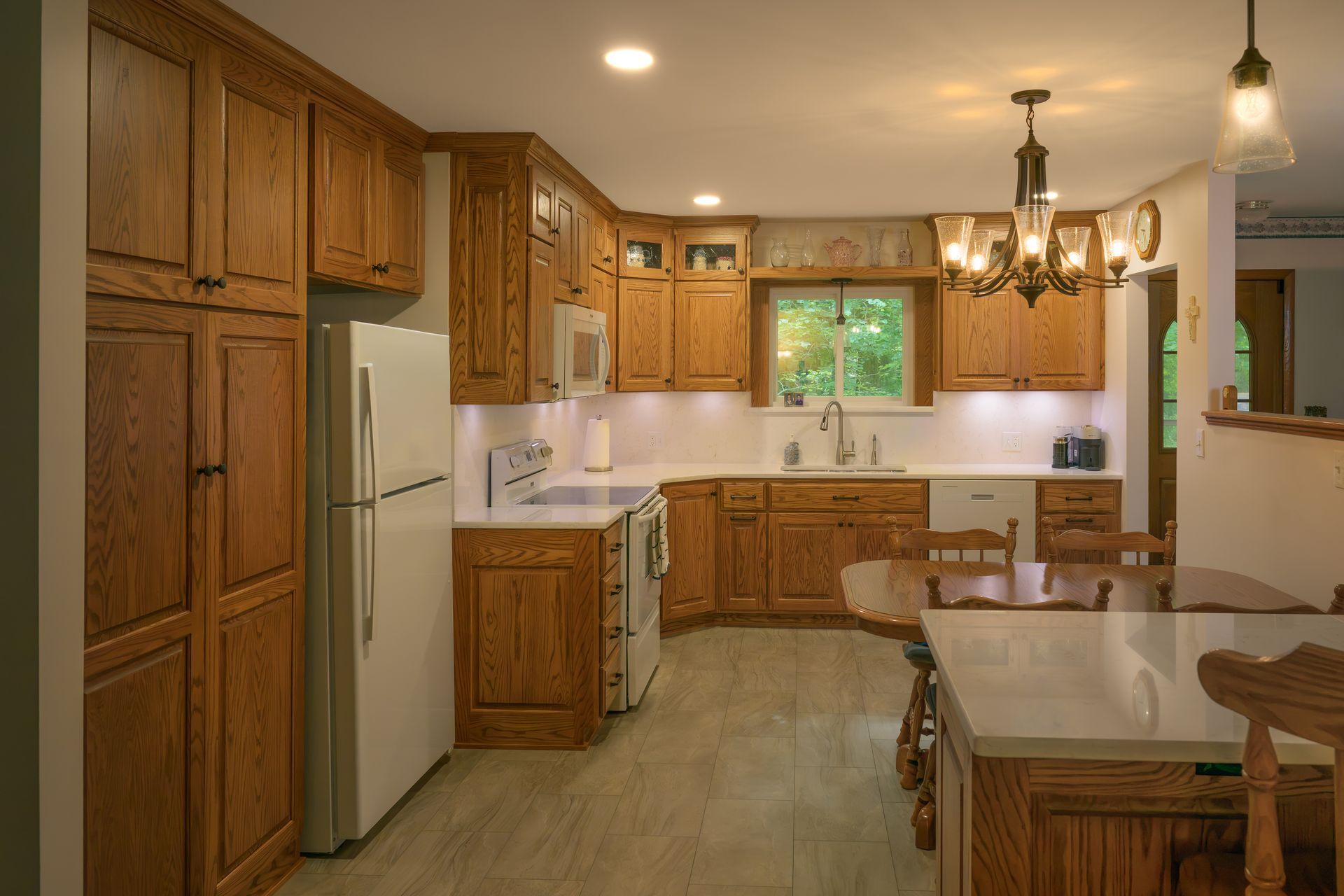 Custom red oak kitchen cabinets.