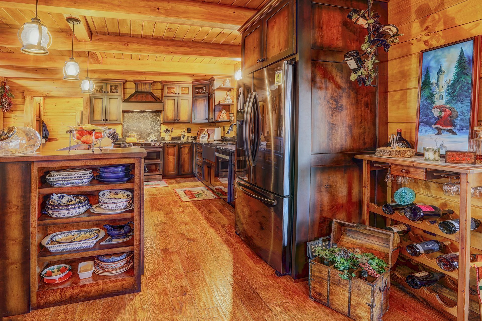 Custom stained wood kitchen cabinets in a log home for a rich, warm look.
