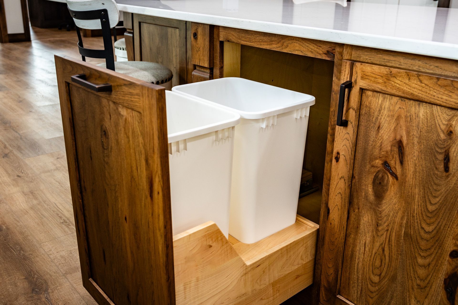 Custom stained hickory wood waste basket pullout.