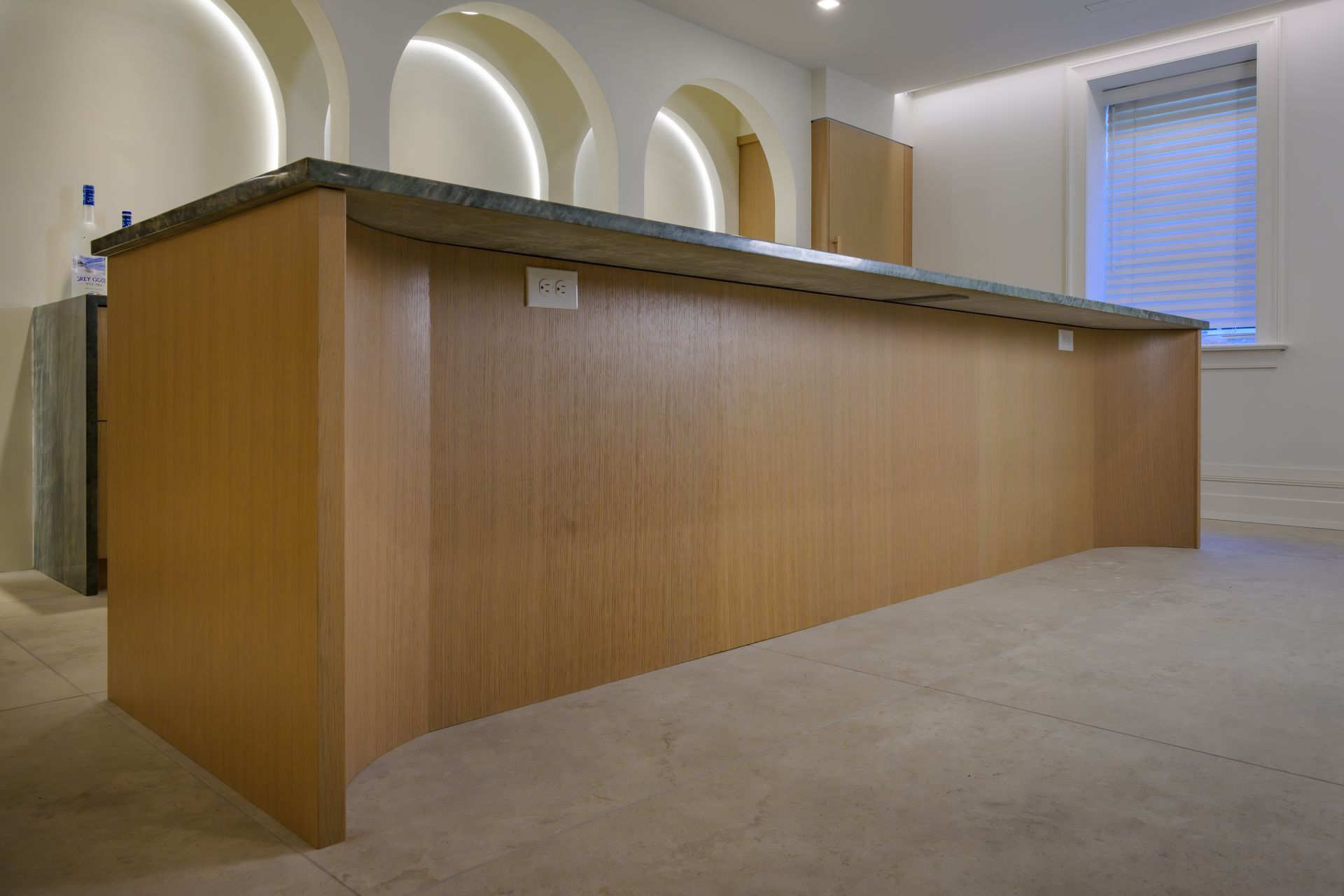 Custom curved island, wire brushed, rift sawn white oak.