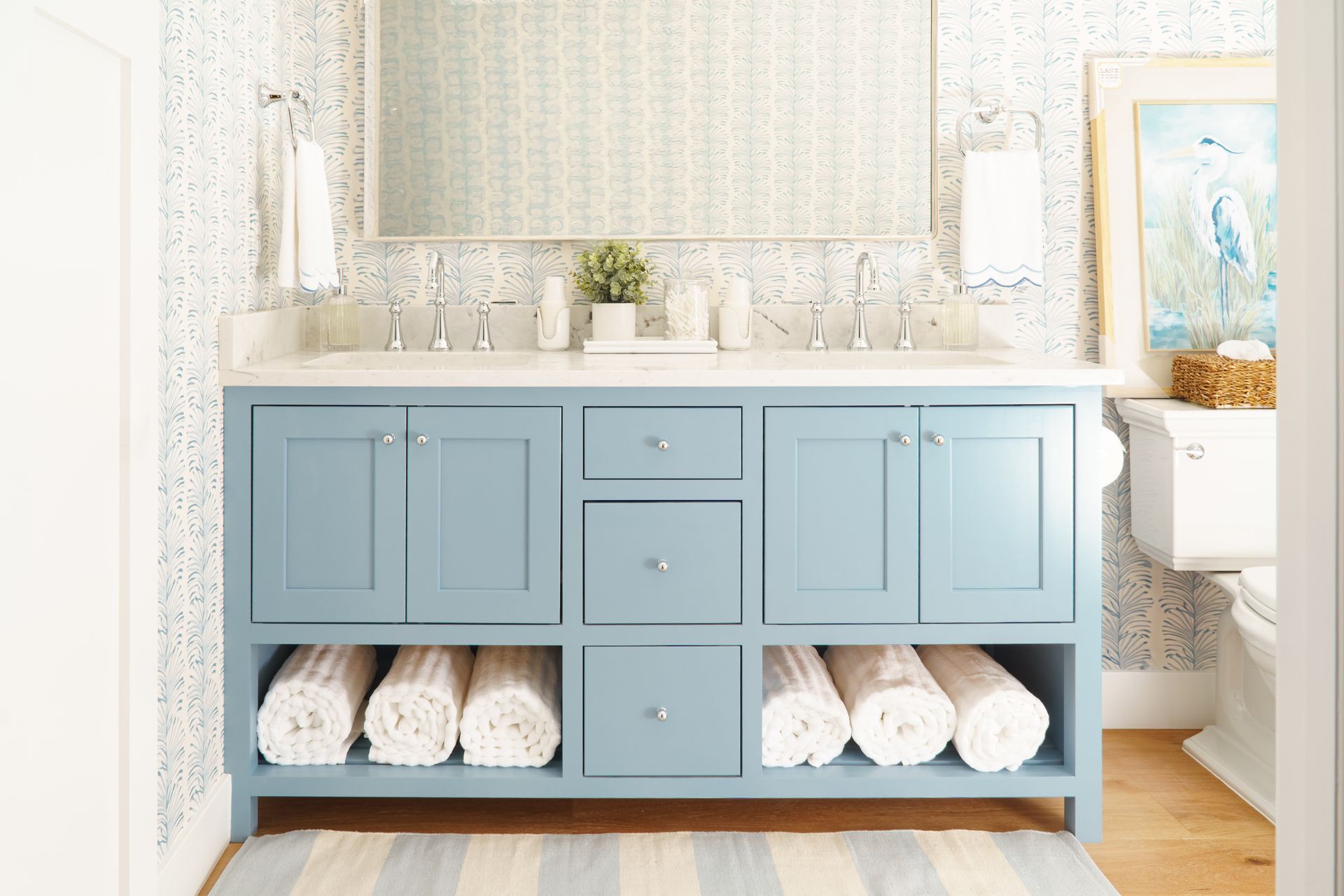 Custom painted light blue wood double bathroom vanity in a modern style