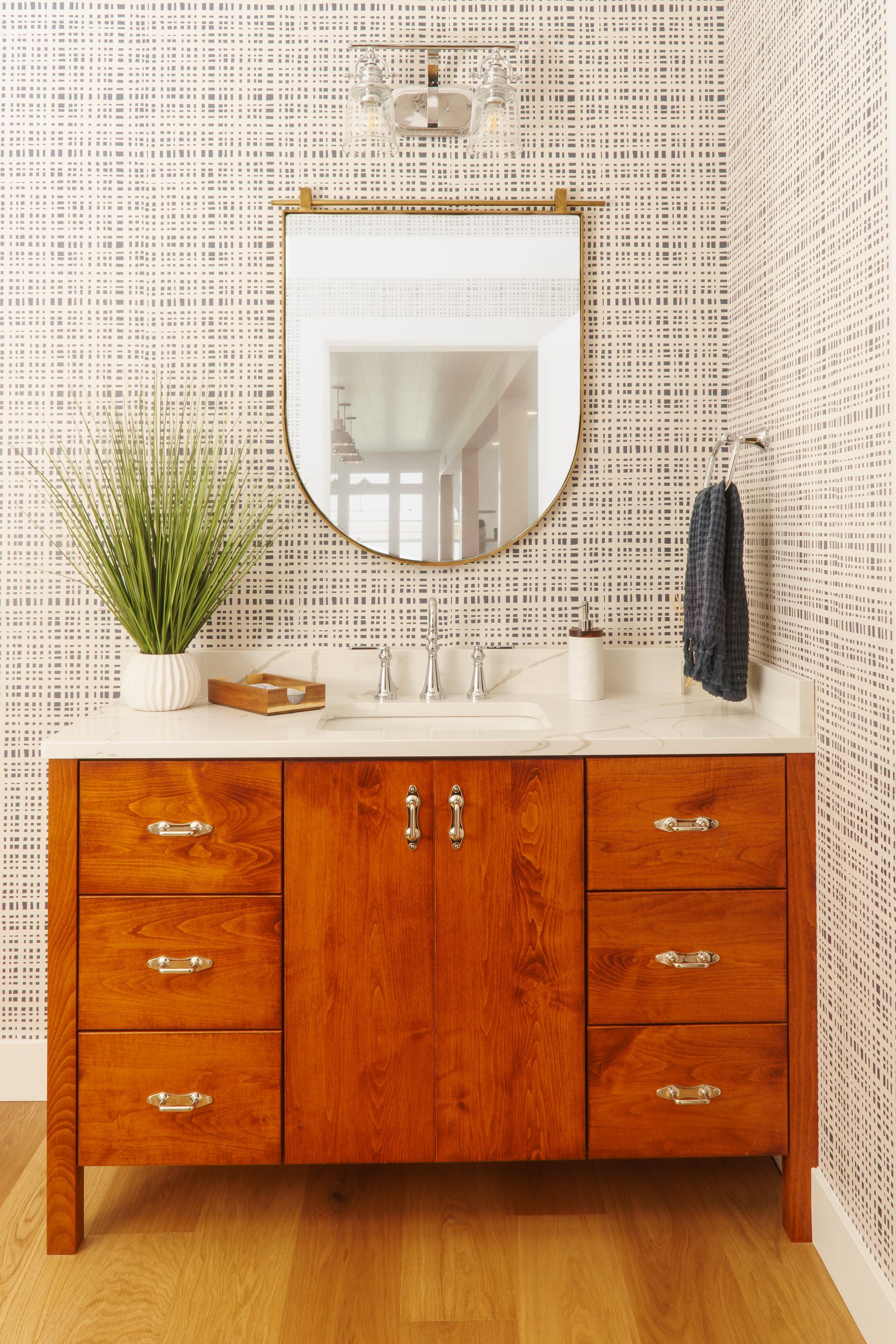 Custom maple, stained red, wood bathroom vanity with legs.