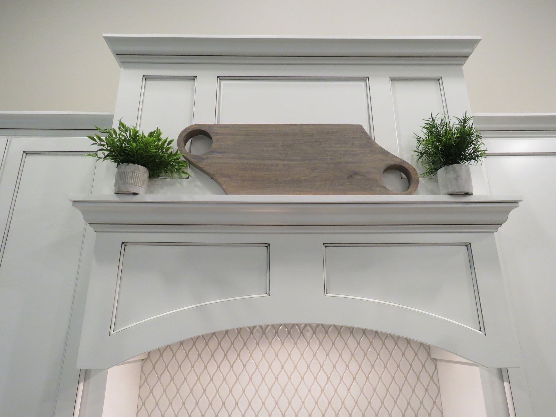 White painted kitchen range hood. Square style.