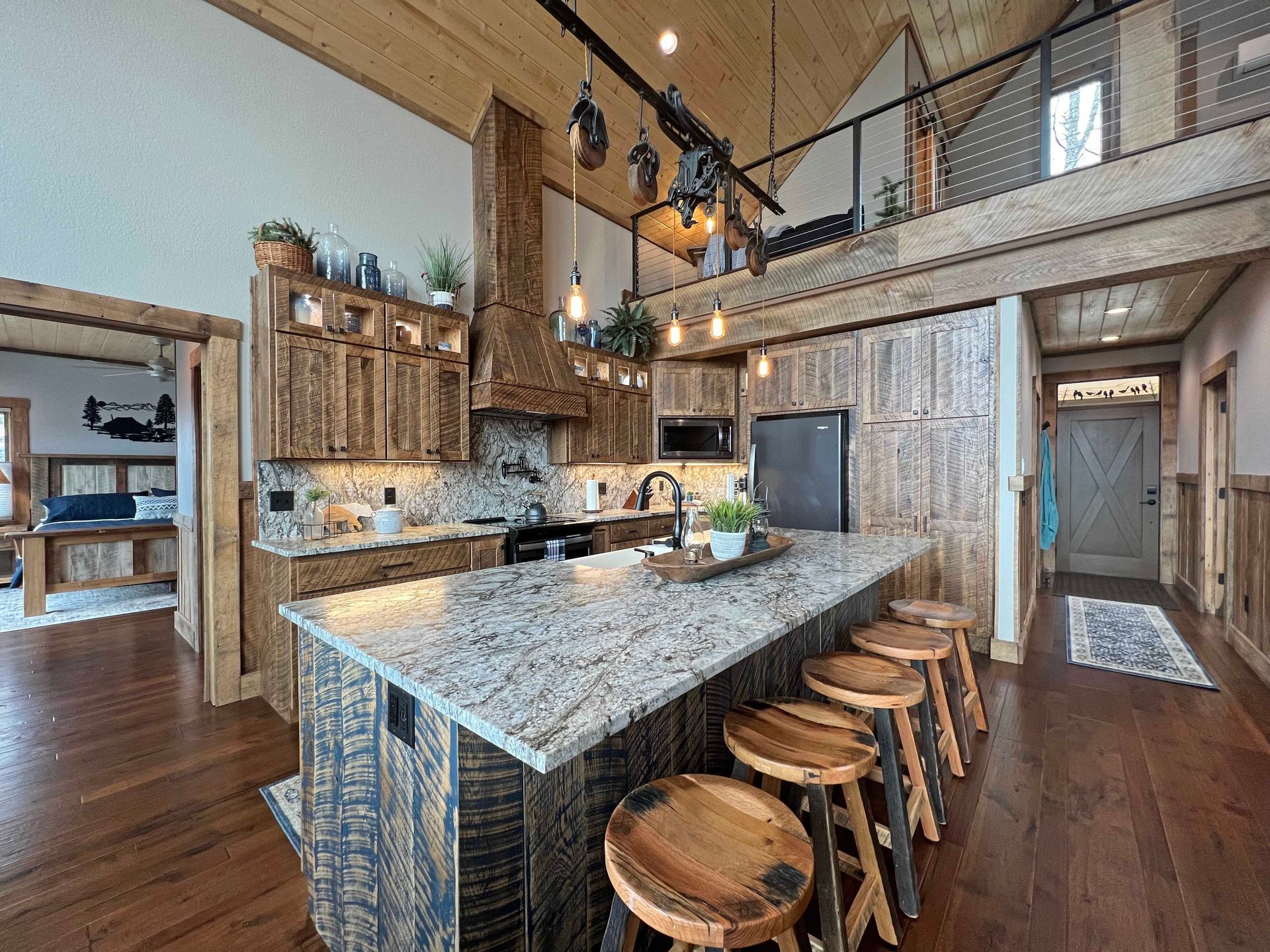 Custom kitchen cabinets, hood & island, rustic rough sawn look.