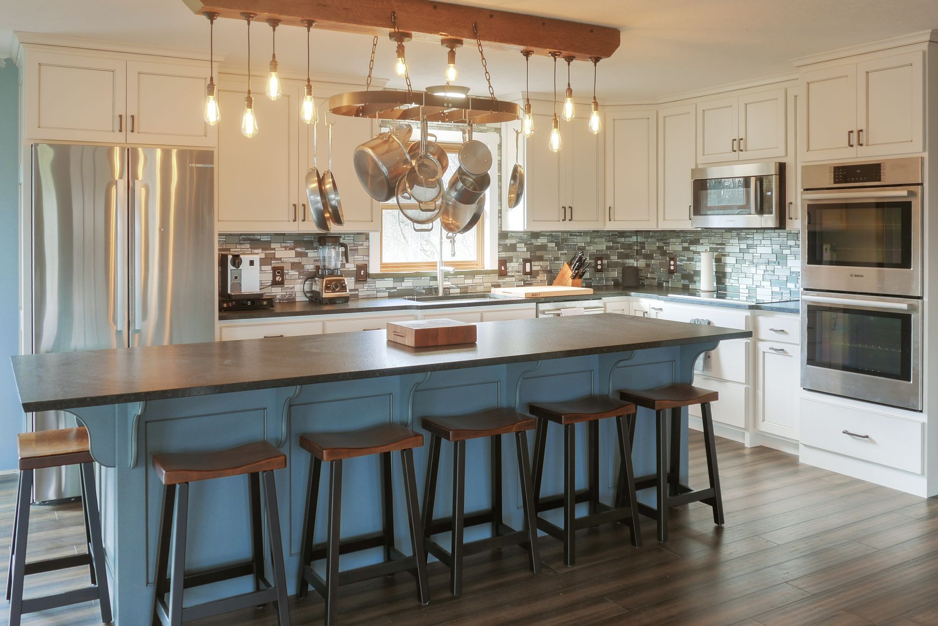 Custom white and blue painted and glazed kitchen cabinets and island.
