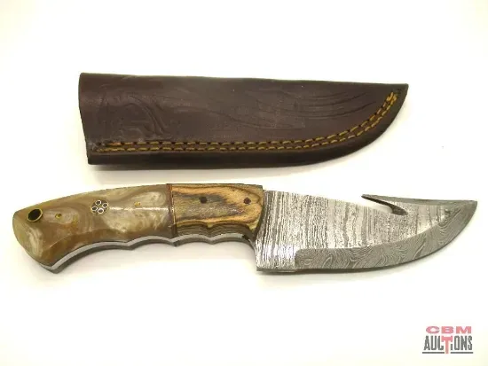 Damascus steel knife with wooden handle and leather sheath.