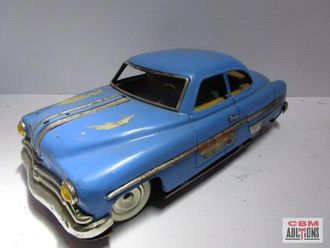 A blue toy car with the word auction on the bottom