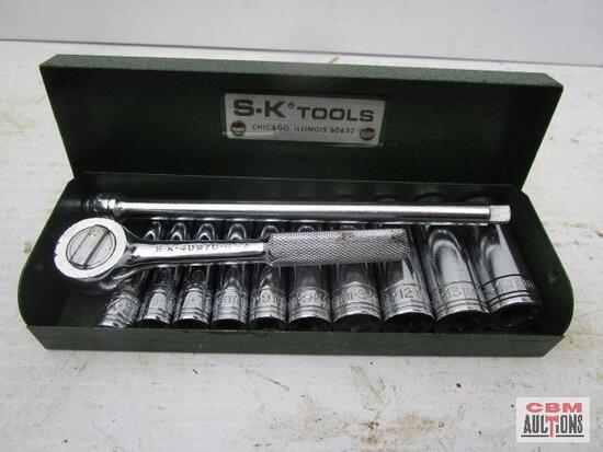 A box of s.k tools with sockets and a ratchet