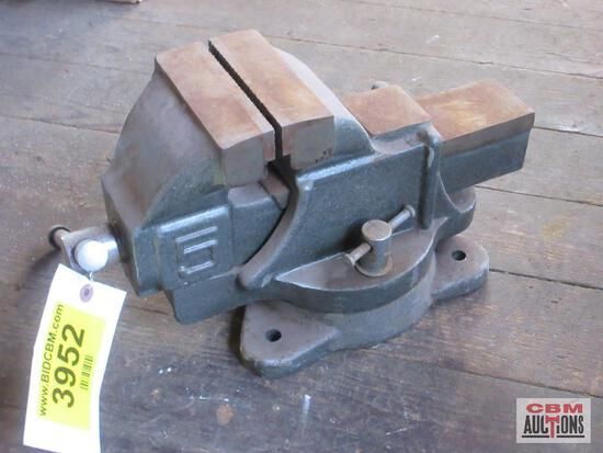 A vise with a tag that says 3950 on it