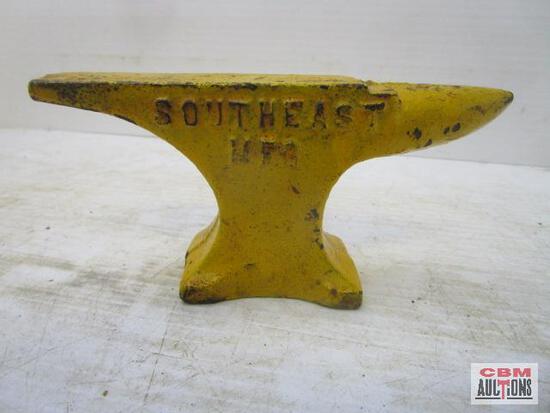 A yellow anvil that says southeast on it
