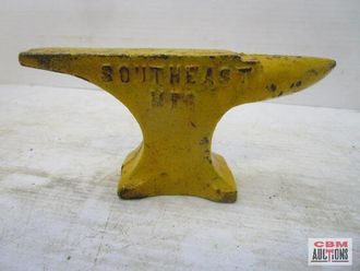 A yellow anvil that says southeast on it