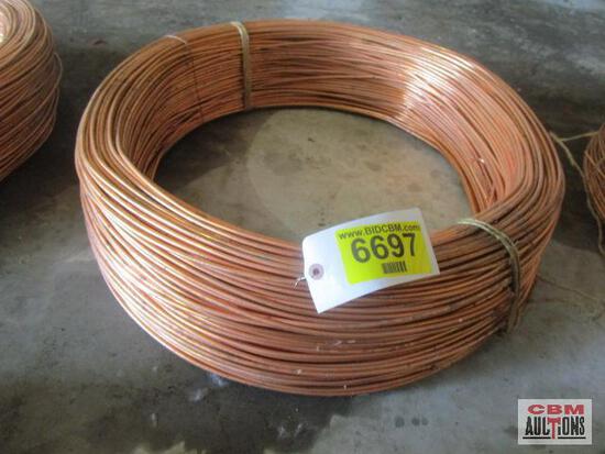 A roll of copper wire with a tag that says 6697