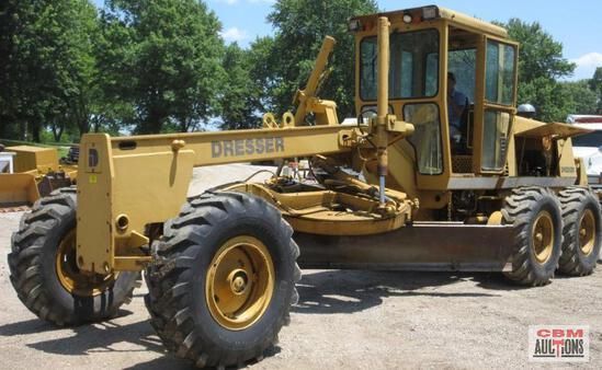 A yellow tractor with the word dresden on it