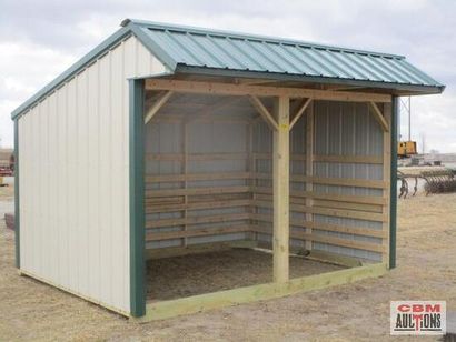 A small shed with a blue roof is for sale by gbm auctions