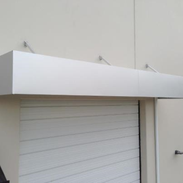 Door Awning White Roll-up - Glen Gardner, NJ - Canopy Erectors, Inc