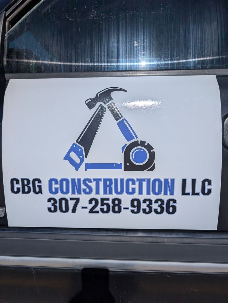 GBG Construction LLC truck sign with hammer logo and phone number 307-258-9336