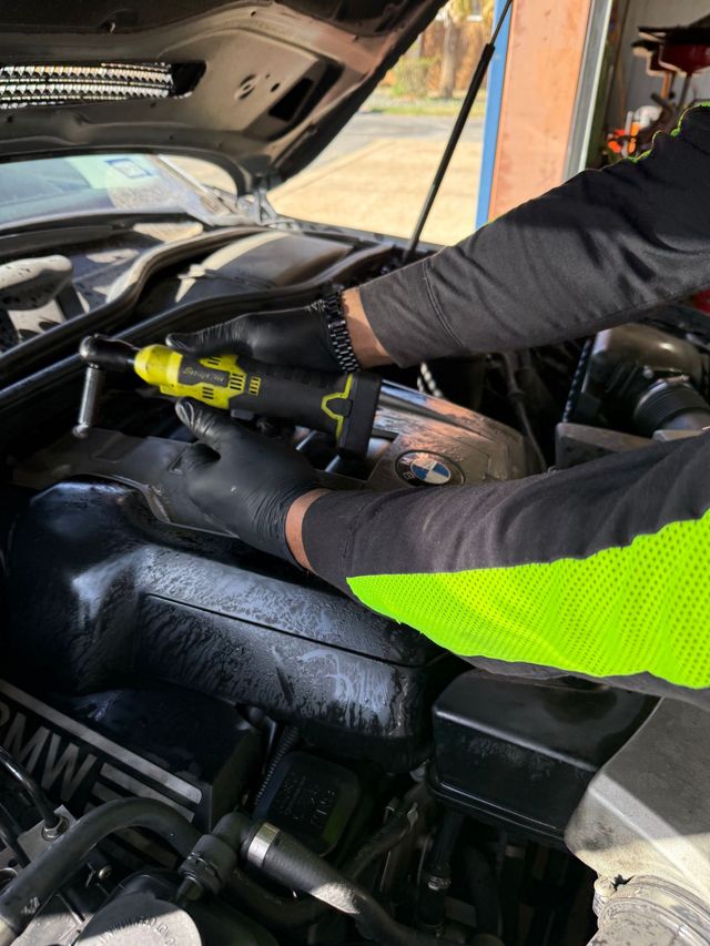 Mechanic Performing Under-Hood Auto Repair Service | L&H Automotive