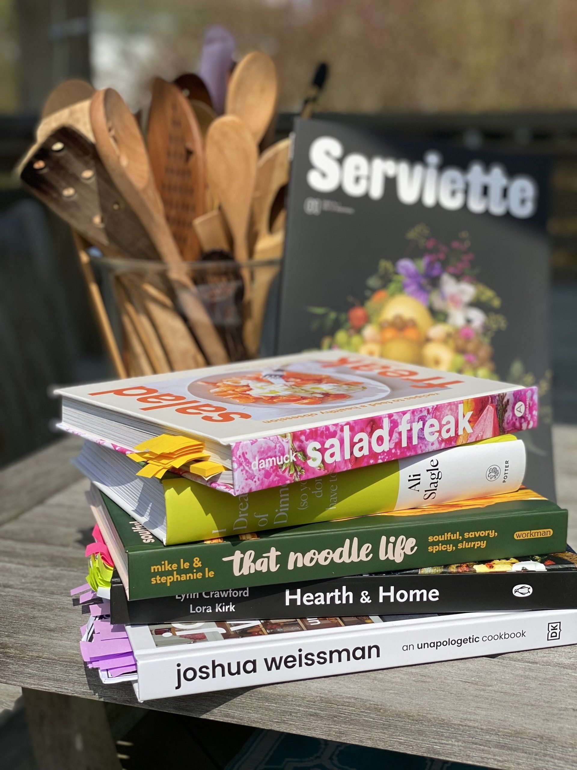 A stack of books sitting on top of each other on a table.