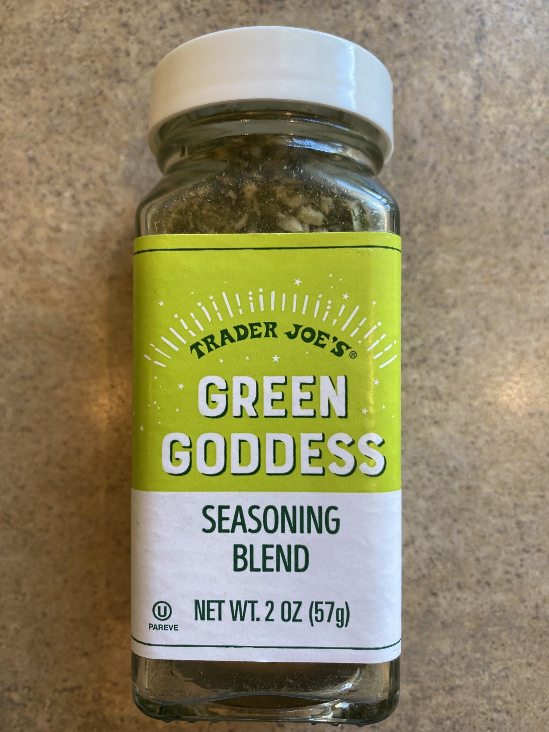 A jar of trader joe 's green goddess seasoning blend