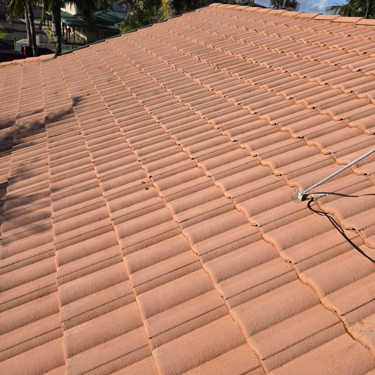 Terracotta Tiled Roof With a Rope — Jervis Bay Pressure Washing & Property Maintenance in Sussex Inlet, NSW